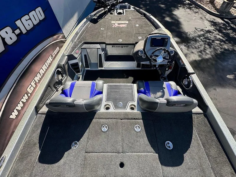 Slide: The Image of 2017 Ranger Z518 boat interior with dual seats and control panel. - 14