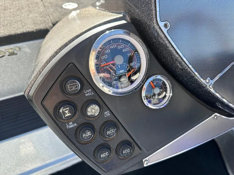 Slide: The Image of Dashboard of a 2017 Ranger Z518 boat with speedometer and control buttons. - 21