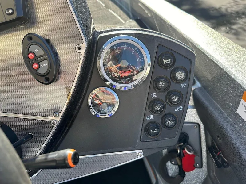 Slide: The Image of 2017 Ranger Z518 boat dashboard with gauges and control panel. - 22