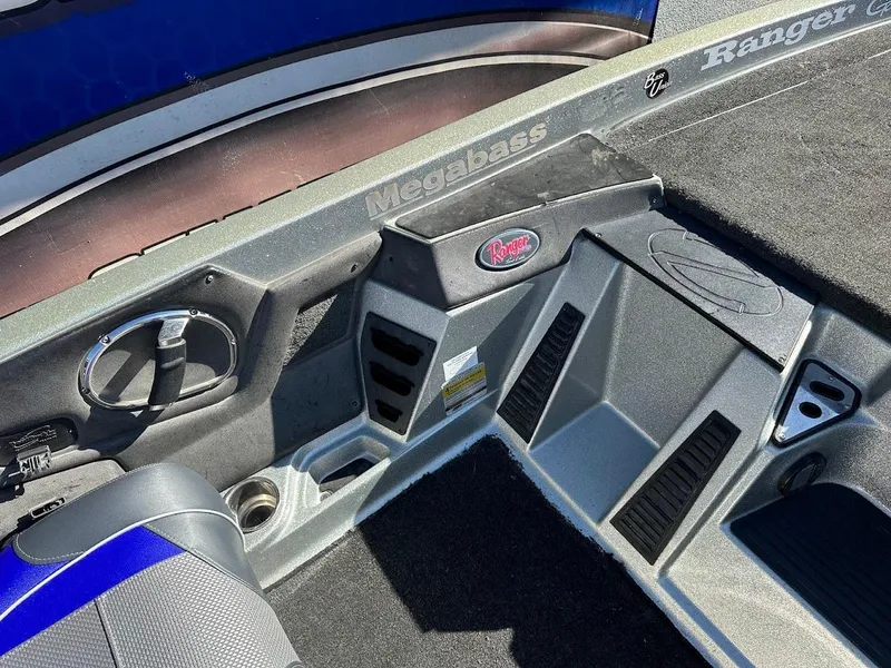 Slide: The Image of 2017 Ranger Z518 boat interior with Megabass branding and seating area. - 27