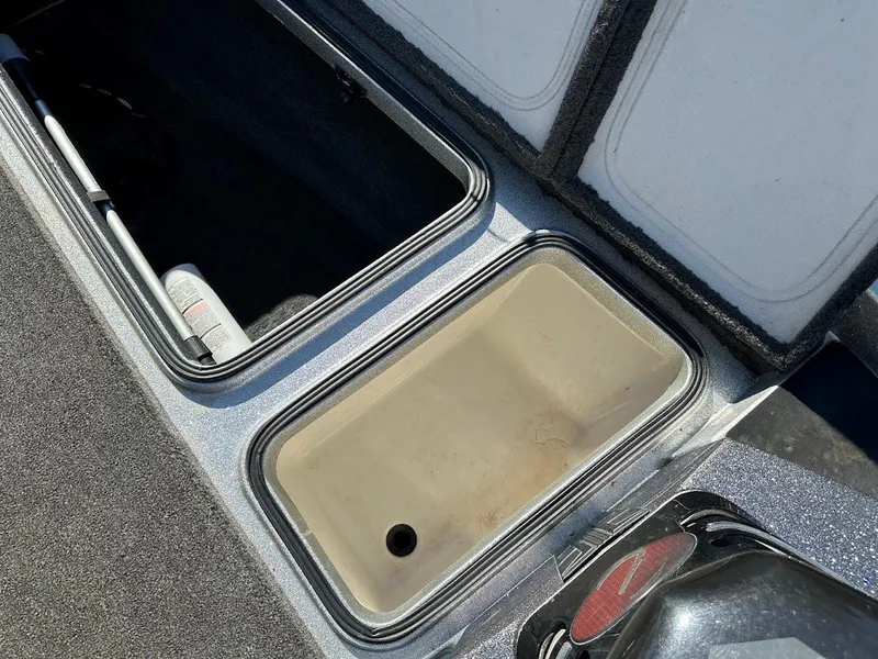 Slide: The Image of 2017 Ranger Z518 boat storage compartments, open and empty. - 31