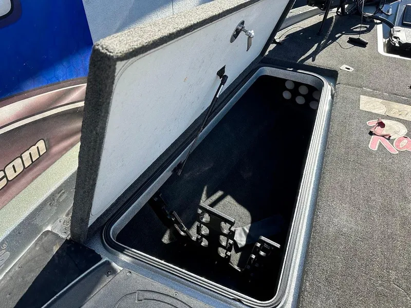 Slide: The Image of Open storage compartment in 2017 Ranger Z518 boat. - 33