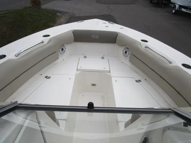 Slide: The Image of 2022 Key West 239 DFS boat interior with spacious seating and storage compartments. - 15