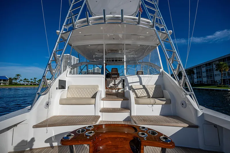 Slide: The Image of 2023 Viking 54 Open yacht with spacious deck and seating area. - 17