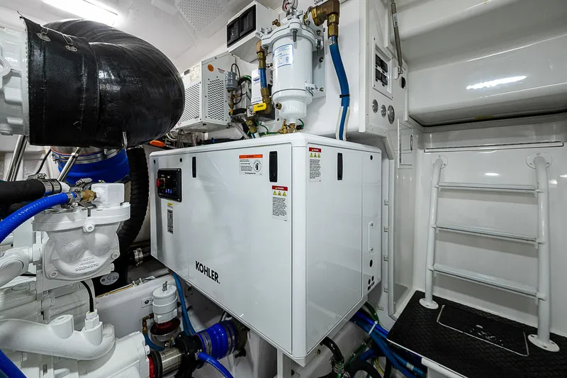 Slide: The Image of Engine room of 2023 Viking 54 Open yacht with Kohler generator. - 35