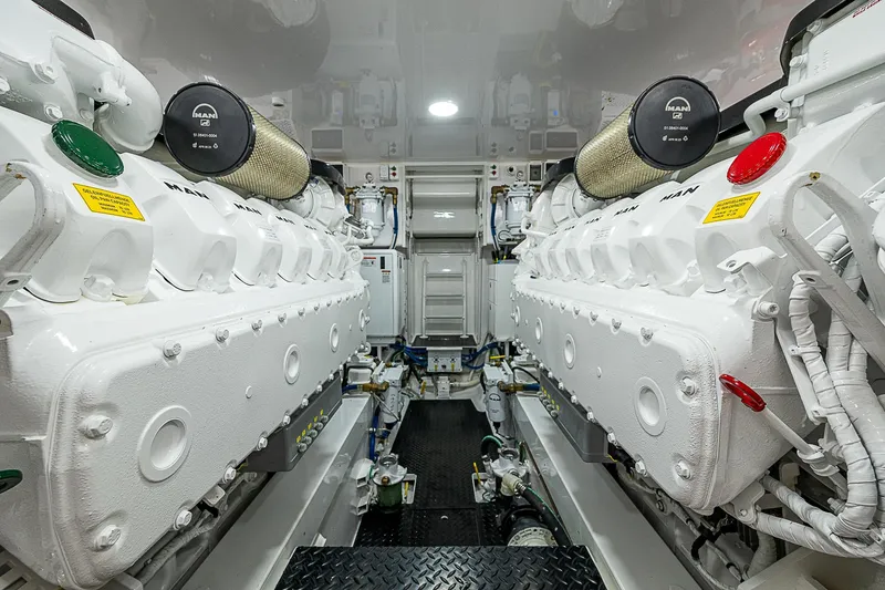 Slide: The Image of Engine room of 2023 Viking 54 Open yacht, showcasing dual engines and mechanical systems. - 44