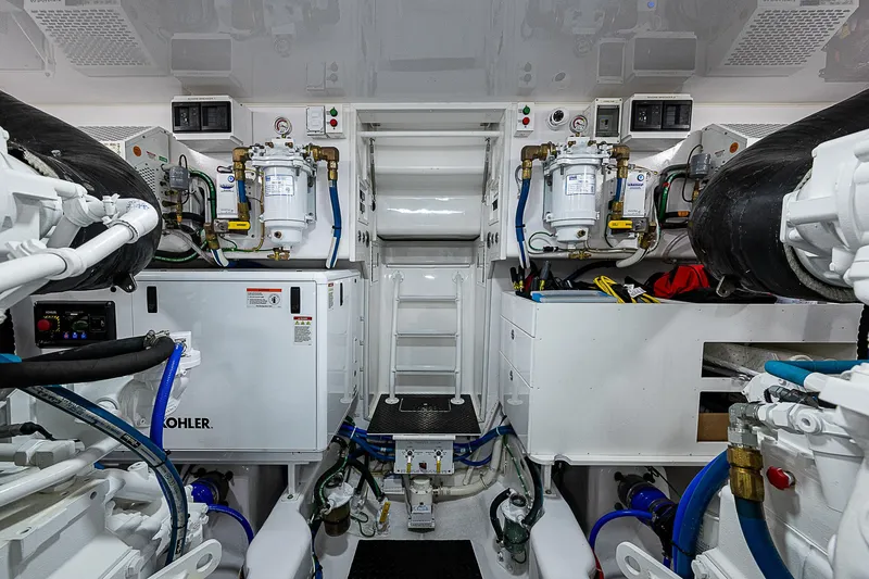 Slide: The Image of Engine room of 2023 Viking 54 Open yacht, featuring advanced machinery and equipment. - 45