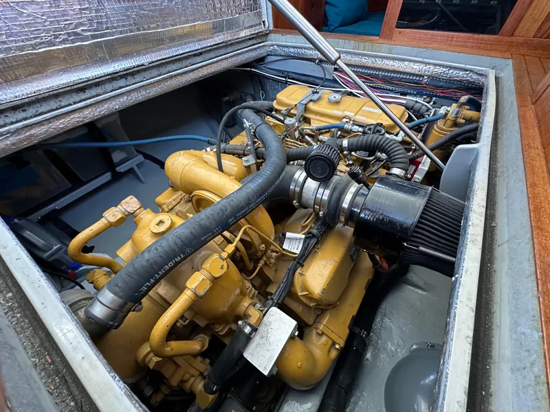 Slide: The Image of Electrical panel inside a 1994 BHM Lobster Style CUSTOM boat, showcasing wiring and components. - 11