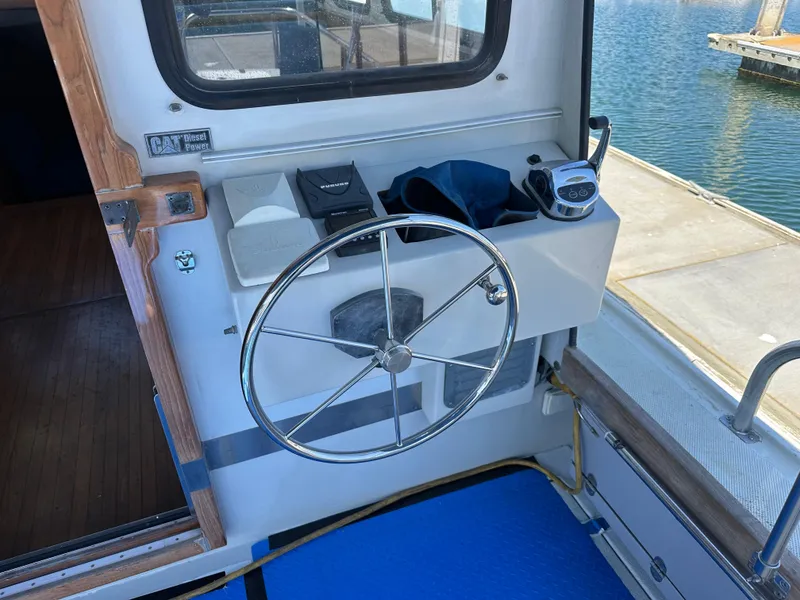 Slide: The Image of Yellow engine of a 1994 BHM Lobster Style CUSTOM boat, detailed view. - 13