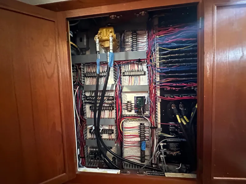 Slide: The Image of 1994 BHM Lobster Style CUSTOM boat interior with wood finish and blue seating. - 8