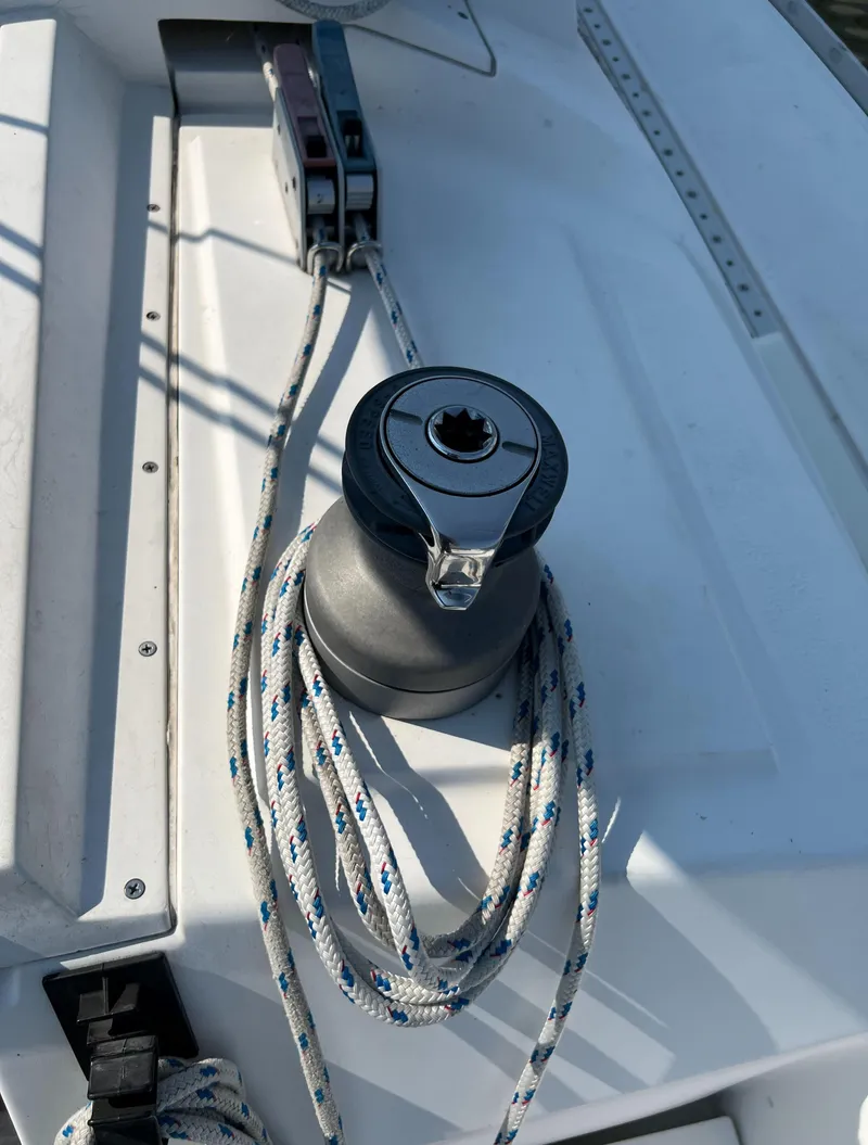 Slide: The Image of Winch and rope on 1986 Hunter 31 sailboat deck. - 19