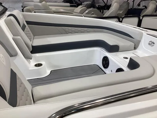 Slide: The Image of 2025 Hurricane SunDeck 217 OB boat interior with gray and white seating. - 7