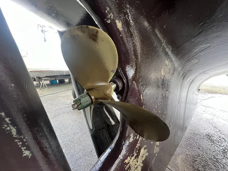 Slide: The Image of Close-up of a 1987 Bayfield 32C boat propeller in dry dock. - 45