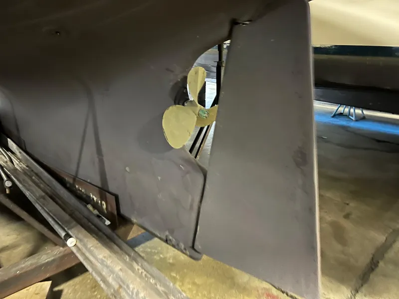 Slide: The Image of 1987 Bayfield 32C sailboat propeller and rudder in dry dock. - 46