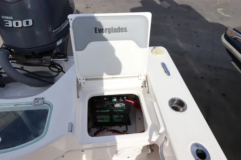 Slide: The Image of Open battery compartment on 2012 Everglades 243 Center Console boat. - 16
