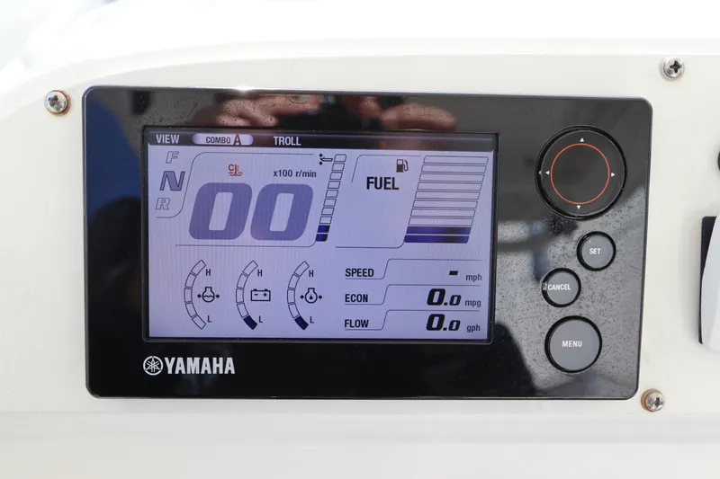 Slide: The Image of Yamaha display on 2012 Everglades 243 Center Console showing fuel and speed metrics. - 25
