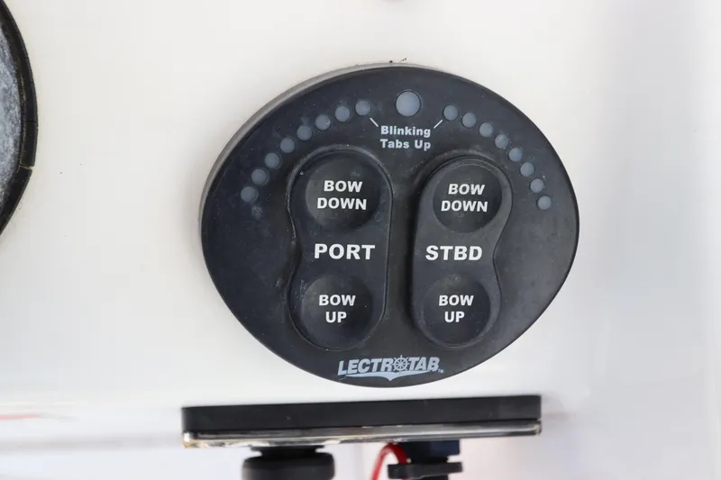 Slide: The Image of Lectrotab control panel on 2012 Everglades 243 Center Console boat. - 26