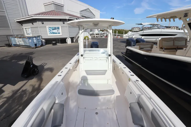 Slide: The Image of 2012 Everglades 243 Center Console boat docked at marina. - 30