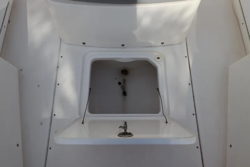 Slide: The Image of 2012 Everglades 243 Center Console boat interior sink area. - 31