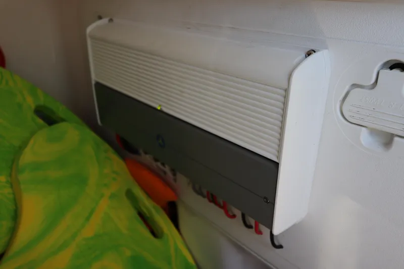 Slide: The Image of Air conditioning unit inside 2012 Everglades 243 Center Console boat. - 33