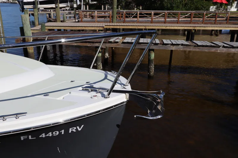 Slide: The Image of 2019 Back Cove 34O boat docked, showing bow and anchor. - 11