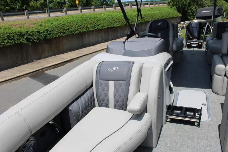 Slide: The Image of 2025 Barletta Lusso 23M pontoon boat interior with luxurious seating and modern design. - 10