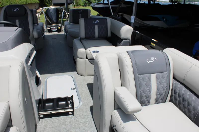 Slide: The Image of 2025 Barletta Lusso 23M pontoon boat interior with luxurious seating and modern design. - 11