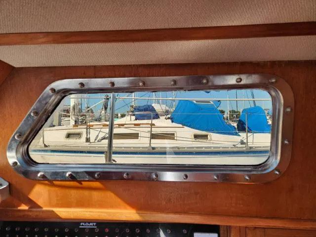 Slide: The Image of View of sailboat through cabin window, Custom King's Legend 41, 1982 model. - 21