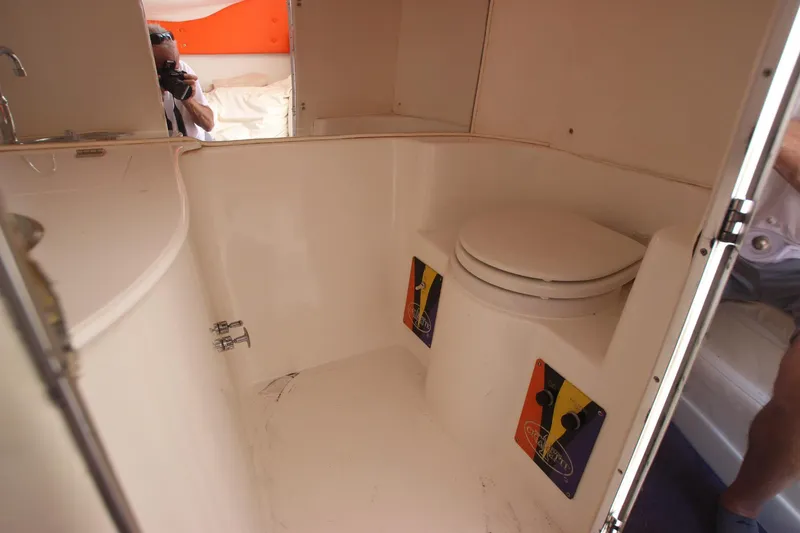 Slide: The Image of Interior of 2001 Cigarette 46 Rough Rider boat bathroom with toilet and sink. - 20