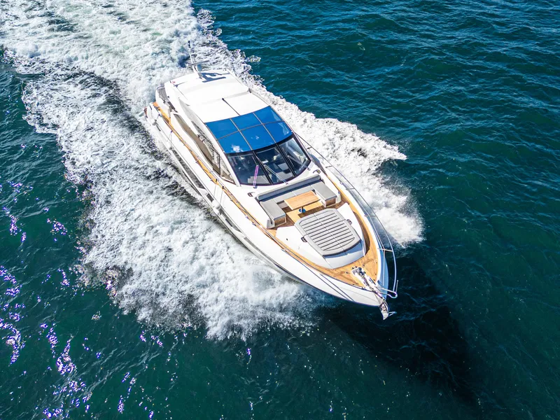 Slide: The Image of Sunseeker Predator 74 yacht cruising on open water, 2020 model. - 16