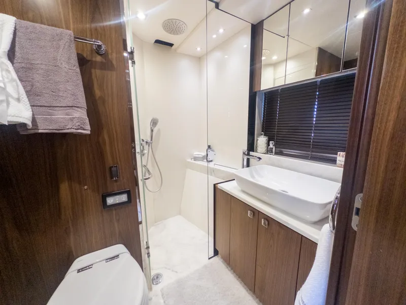 Slide: The Image of Luxurious bathroom in 2020 Sunseeker Predator 74 yacht with modern fixtures and elegant design. - 23
