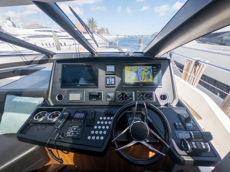 Slide: The Image of Cockpit of 2020 Sunseeker Predator 74 yacht with advanced navigation systems. - 32