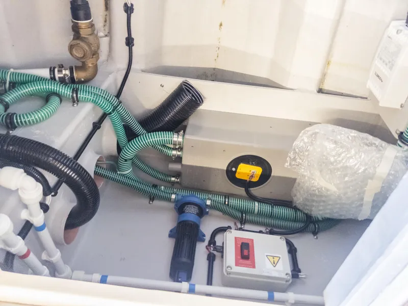 Slide: The Image of Engine compartment of 2020 Sunseeker Predator 74 with hoses and electrical components. - 43