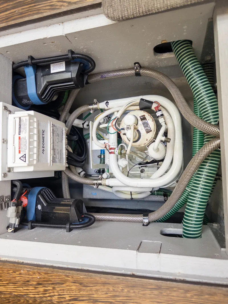 Slide: The Image of Engine compartment of 2020 Sunseeker Predator 74 yacht, showcasing mechanical components and wiring. - 44