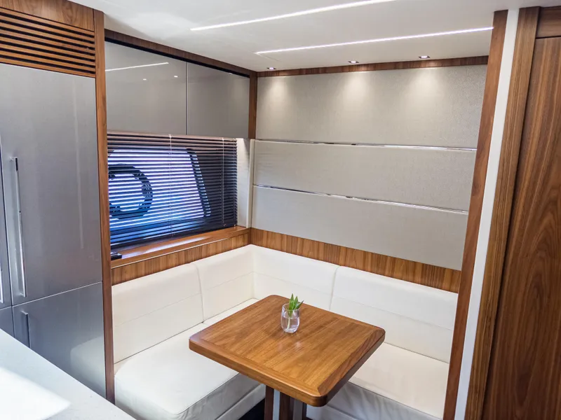 Slide: The Image of Luxurious interior of 2020 Sunseeker Predator 74 yacht with elegant dining area. - 46
