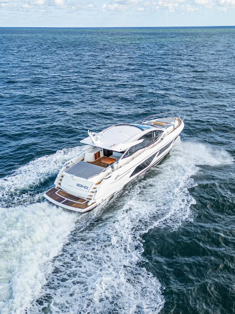 Slide: The Image of Sunseeker Predator 74 yacht cruising on open sea, 2020 model. - 5