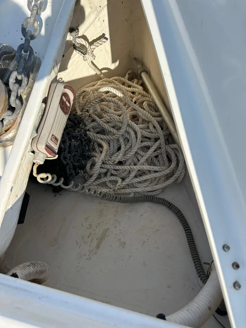 Slide: The Image of Anchor locker of 2011 Beneteau Oceanis 40 with ropes and chain. - 17
