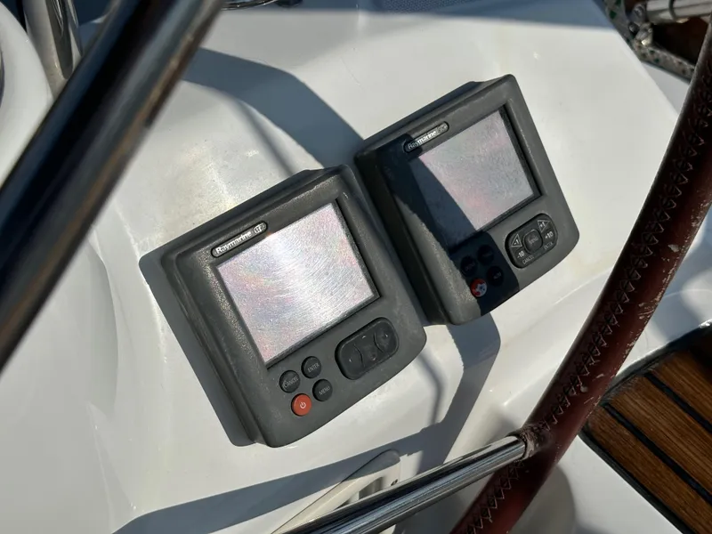 Slide: The Image of Two navigation instruments on a 2011 Beneteau Oceanis 40 yacht dashboard. - 39