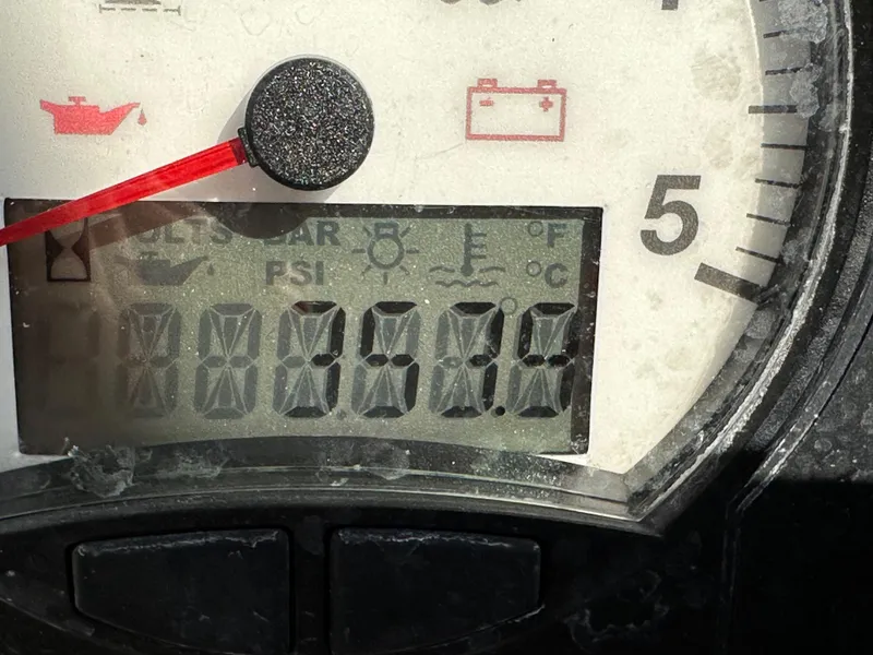 Slide: The Image of Close-up of a Beneteau Oceanis 40 gauge displaying 105.6 hours. - 40