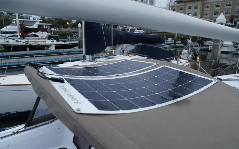 Slide: The Image of Solar panels on Jeanneau Sun Odyssey 410 sailboat, 2020 model, docked at marina. - 38