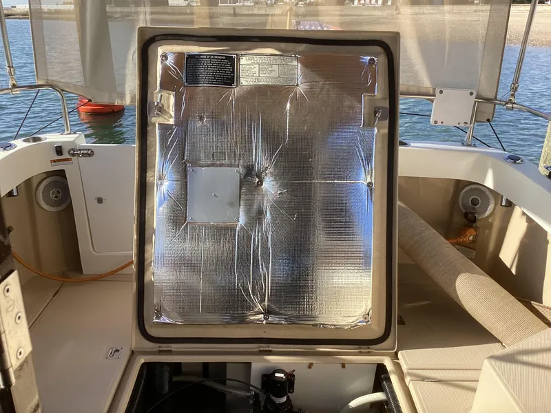 Slide: The Image of 2012 Ranger Tugs R-27 boat engine compartment with reflective insulation. - 32