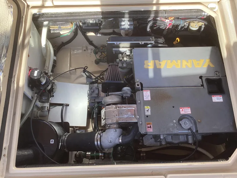 Slide: The Image of 2012 Ranger Tugs R-27 engine compartment with Yanmar engine. - 35