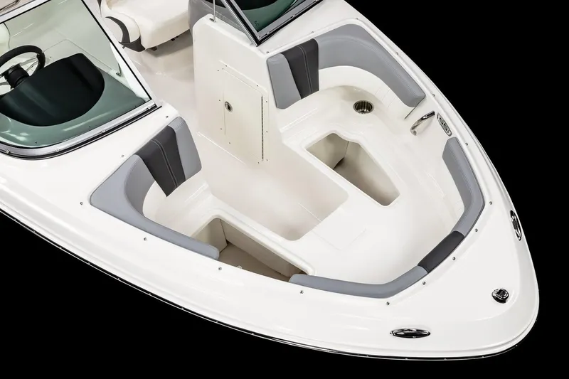 Slide: The Image of 2025 Chaparral 19 SSi OB boat interior with seating and storage compartments. - 7