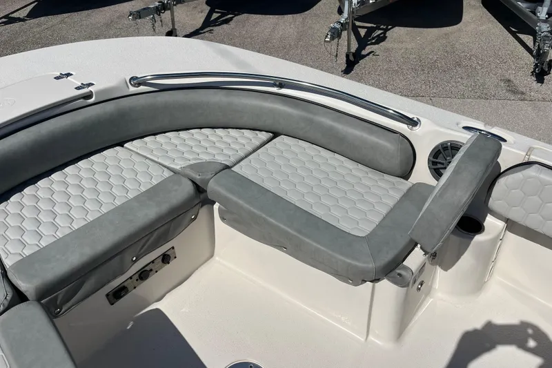 Slide: The Image of 2025 Carolina Skiff 21 Ultra Elite boat interior with gray cushioned seating. - 11