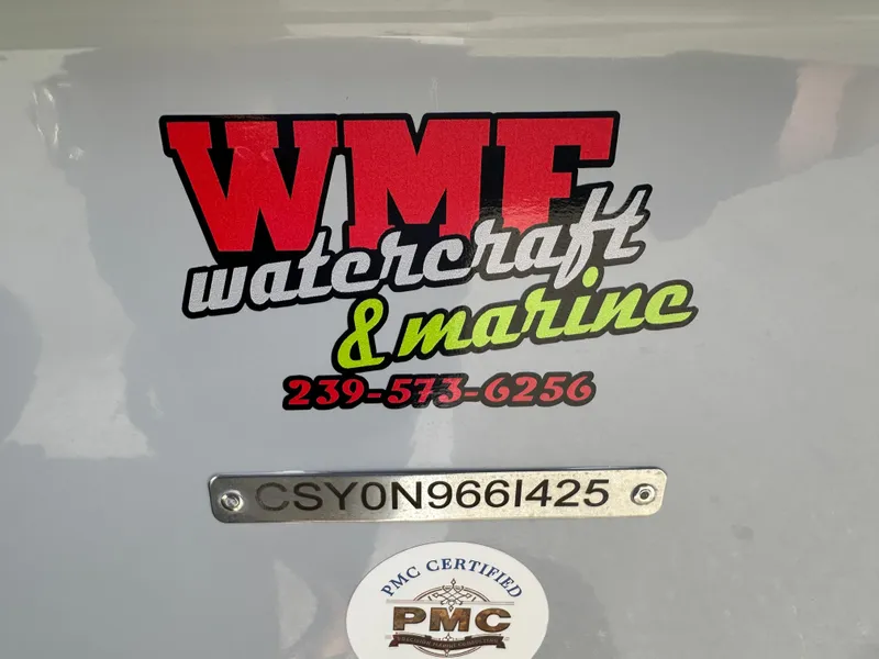 Slide: The Image of WMF Watercraft & Marine logo on Carolina Skiff 21 Ultra Elite, 2025 model. - 18
