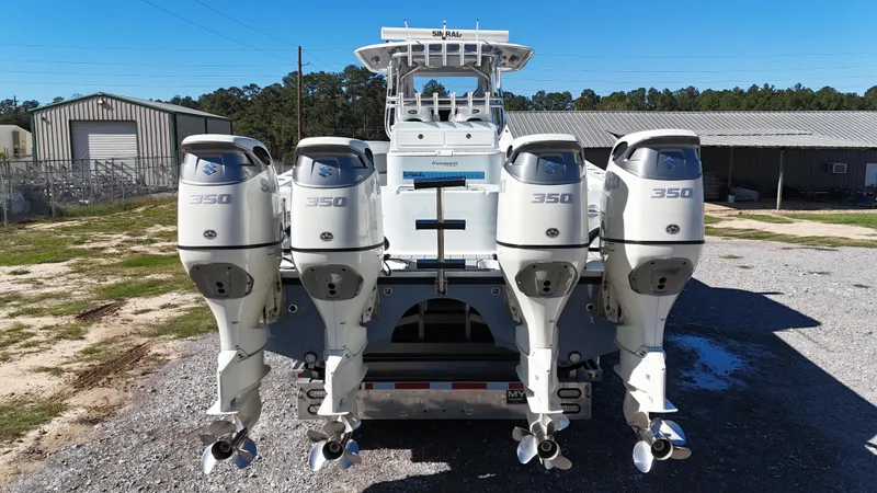 Slide: The Image of 2016 Freeman 37VH boat with four powerful 350 horsepower outboard engines. - 12