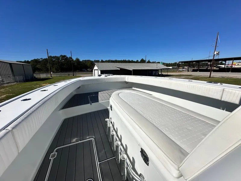Slide: The Image of Freeman 37VH 2016 boat deck with seating, outdoor view, clear sky. - 19