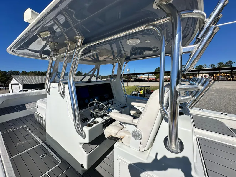 Slide: The Image of 2016 Freeman 37VH boat cockpit with modern controls and seating. - 27