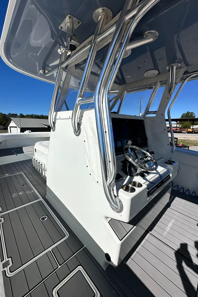 Slide: The Image of Freeman 37VH 2016 boat console with steering wheel and modern design. - 34