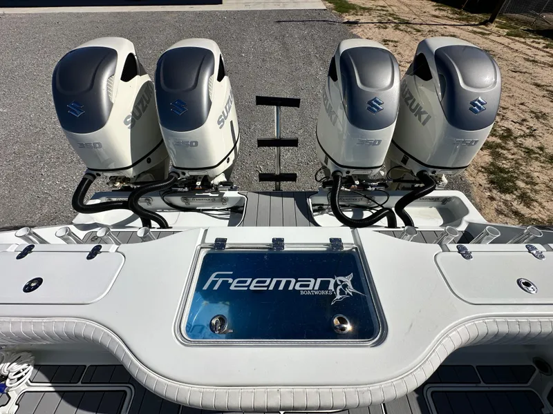 Slide: The Image of 2016 Freeman 37VH boat with four Suzuki outboard engines. - 39